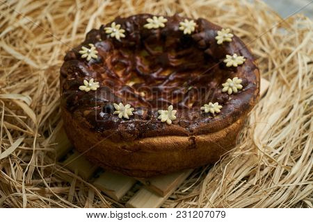 Traditional Ukrainian Wedding Bread Korovai Or Karavai With Decorations On Rustic Straw Background.