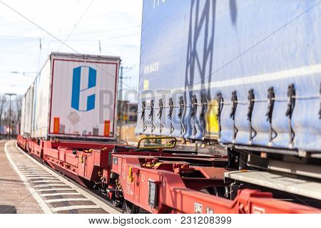 Fuerth / Germany - March 11, 2018: A European Freight Train Passes Train Station Fuerth In Germany