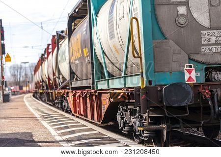 Fuerth / Germany - March 11, 2018: A European Freight Train Passes Train Station Fuerth In Germany