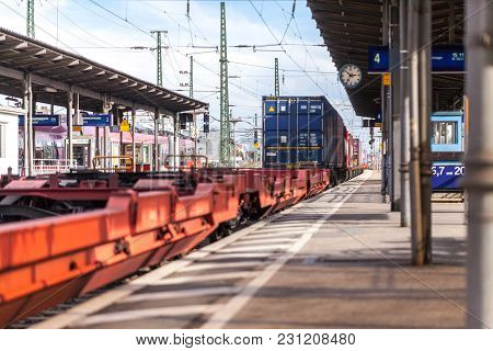 Fuerth / Germany - March 11, 2018: A European Freight Train Passes Train Station Fuerth In Germany