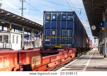 Fuerth / Germany - March 11, 2018: A European Freight Train Passes Train Station Fuerth In Germany