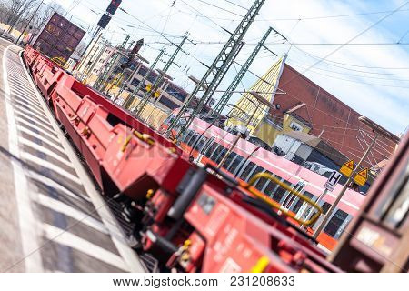Fuerth / Germany - March 11, 2018: A European Freight Train Passes Train Station Fuerth In Germany