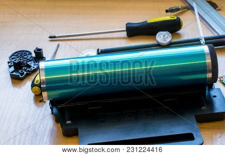 This Part Is Disassembled From The Printer On The Table With The Tools. Drum Unit Photoconductor