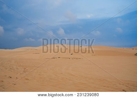White Sand Dunes Muine In Vietnam With Tourists In The Summer