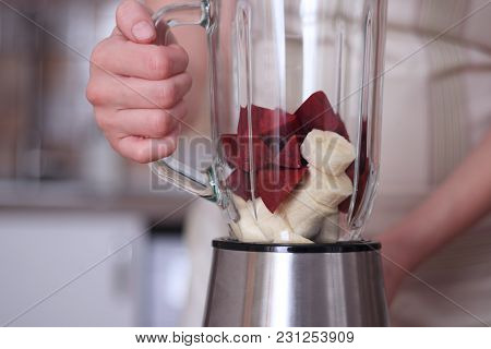 Girl Is Cooking Healthy Detox Beet Smoothie With Banana