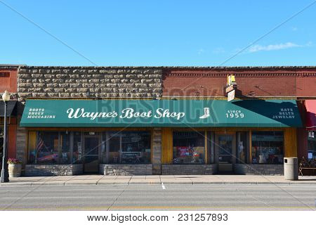 CODY, WYOMING - JUNE 24, 2017: Waynes Boot Shop is one of the shops on Sheridan Avenue in Cody, Wyoming.