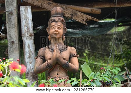 Thailand Male Figure Wei Position  In Garden Centre