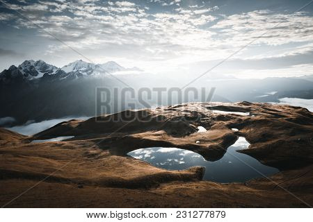 Lake Koruldi near Mt. Ushba. Location Upper Svaneti, Georgia country, Europe. Main Caucasian ridge. Scenic image of beautiful nature landscape, amazing mountain view. Explore the beauty of earth.