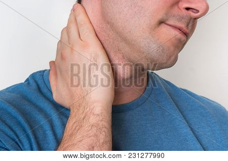 Man With Muscle Injury Having Pain In His Neck - Body Pain Concept