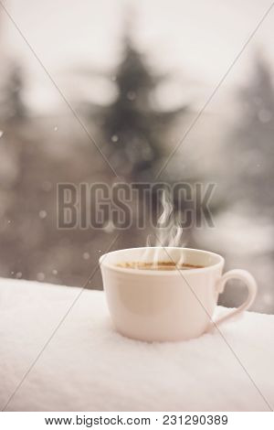 A Coffee In The Snow. Pink Coffee Cup, Coffee Mug. Beautiful Winter Landscape Background. Cozy Winte