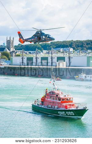 Fecamp-france, September 16,2017 - Non Foucus Scene Helicopter In Flight Ready To Rescue A Man With 