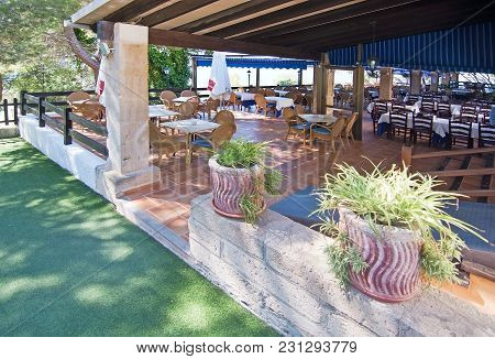 Alcudia, Mallorca, Spain - June 12, 2017: Restaurant Near Hermitage And Hostal Victoria On A Sunny D