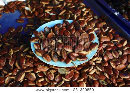 Stack Of Irvingia Malayana In Dish For Sale At Street Market In Thailand