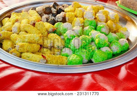 Yellow ,green And Black Shumai In Metal Tray For Sale At Walking Street Market
