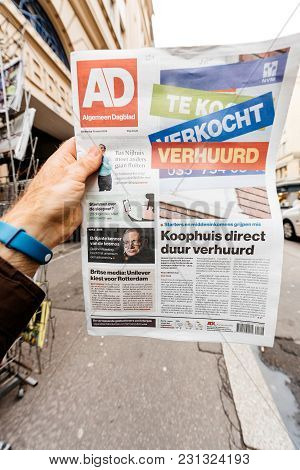 Paris, France - Mar 15, 2018: Algemeen Dagblad  Newspaper With Portrait Of Stephen Hawking The Engli