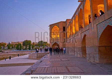 Isfahan, Iran - October 20, 2017: The  Khaju Bridge Is Popular Meeting Place Among The Locals And Fa
