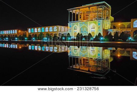 The Evening Walk Around The Fountains In Nagsh-e Jahan Square, Famous For Its Architectural Ensemble