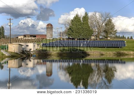 Solar Pannels On A Farm Field In Rural Oregon.
