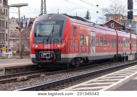 Fuerth / Germany - March 11, 2018: Re Regional Express Train From Deutsche Bahn Passes Train Station