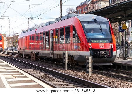 Fuerth / Germany - March 11, 2018: Re Regional Express Train From Deutsche Bahn Passes Train Station