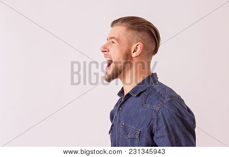 Side View Happy, Stylish Hipster Man Screaming Loudly While Isolated On White Background With Copysp