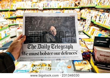Paris, France - Mar 15, 2018: International Newspaper Daily Telegraph With Portrait Of Stephen Hawki