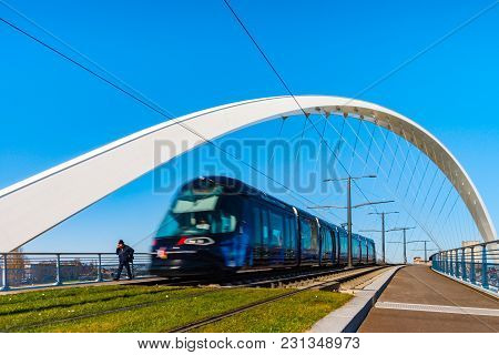Tram Movement On The Citadelle Bridge Across Bassin Vauban For Trams And Bicycles