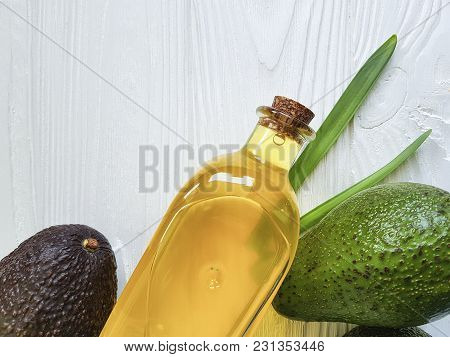 Avocado Oil On White Wooden Background Avocado Oil, Manicure, Ripe, Ingredient, Nutritious, Half