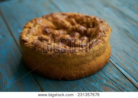Round Loaf Karavai On Wooden Rustic Table Background. Traditional Slavic Russian And Ukranian Festiv