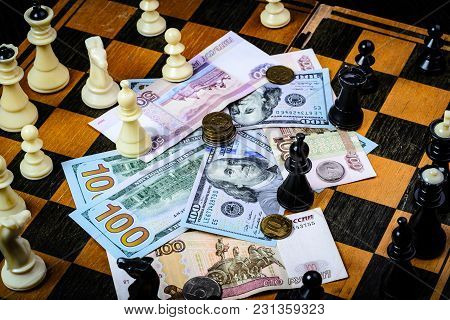 Chess Board With Cash And Chess On A Dark Background