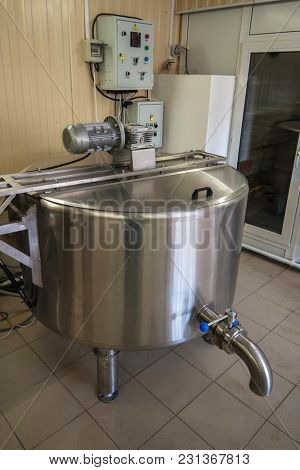 Cheese production at dairy farm, first stage - milk processing