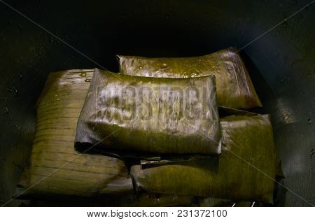 Tamale Mexican food recipe with banana leaves steamed
