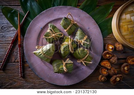 Zongzi Glutinous sticky Rice Dumplings recipe wrap with bamboo leaves asian food