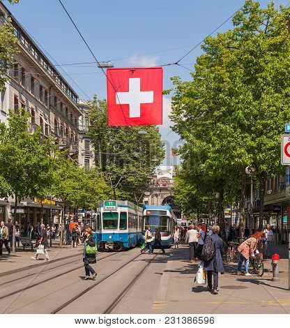 Zurich, Switzerland - 24 April, 2014: View Along Bahnhofstrasse Street. Bahnhofstrasse Street Is The