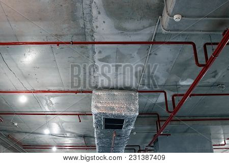 Metal Pipeline Under Concrete Ceiling Of Department Store Construction Industry Concept Public Utili