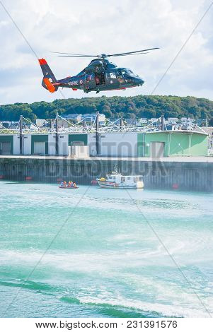 Fecamp-france, September 16,2017 - Non Foucus Scene Helicopter In Flight Ready To Rescue A Man With 