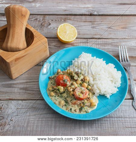 Coconut Milk Indian Dish Dal Wooden Background.