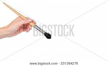 Paint Brush In Hand Isolated On White Background. Copy Space, Template.