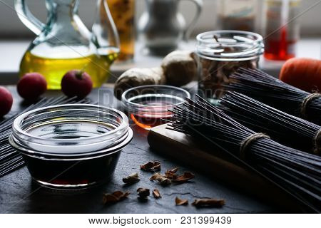 Black Rice Vermicelli, Vinegar, Olive Oil And Vegetables. Asian Cuisine Horizontal