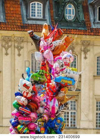 Warsaw, Poland - June 29, 2013: Colorful Balloons Against The Background Of Ancient Buildings. Marke