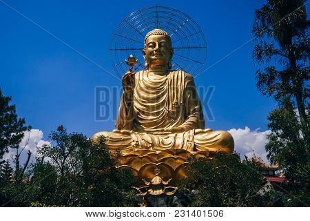 Statue Of Big Golden Sitting Buddha In Dalat, Vietnam