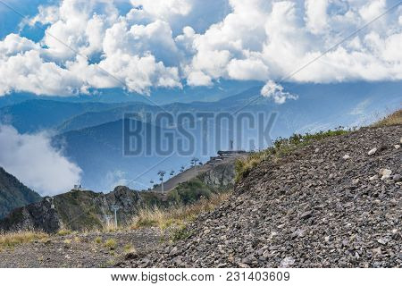 Sochi, Russia-september 30, 2017: Mountain Landscape With Rocky Slopes And The Cable Car In Krasnaya