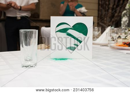 Sand Ceremony Vase In A Wedding With Colored Sand Being Mixed Together. Blending Of The Sands At Wed