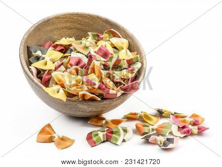 Farfalle Pasta With Vegetables In And Near A Wooden Bowl Isolated On White Background Raw Classic Tr