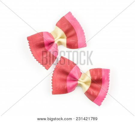 Farfalle Pasta With Red Beet And Paprika Isolated On White Background Top View Two Raw Classic Tradi