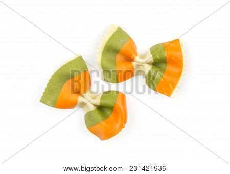Farfalle Pasta With Green Spinach And Orange Carrot Isolated On White Background Top View Two Raw Cl
