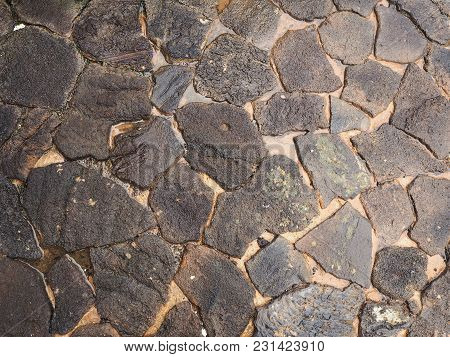 Wet Crazy Paving Slabs Creating A Pattern On The Ground