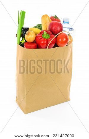 Grocery Shopping Concept Image - Eco Friendly Paper Shopping Bag Filled With Various Food Products.