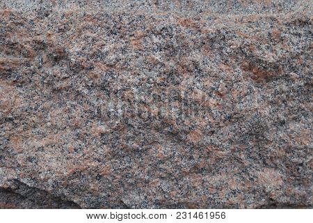 Deliberately Rough Surface Of Pink Granite Stone
