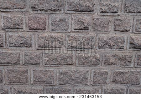Granite Stone Wall Made Of Blocks With Rustication